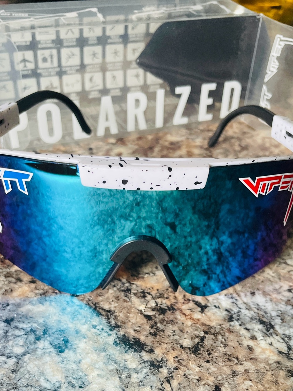 Polarized Sports Sunglasses - White Speckle Frame with Blue Mirrored Lens